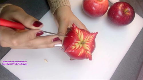 苹果雕刻装饰 ,把苹果雕刻成一朵花,太好看了把,舍不得吃了 