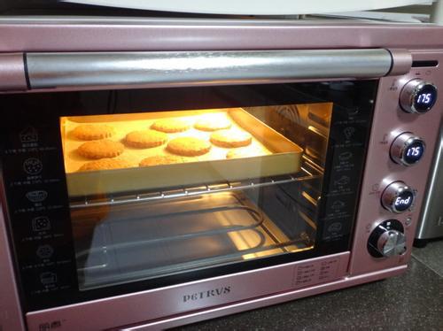 烤箱预热时烤箱上的功能按钮要调成什么 