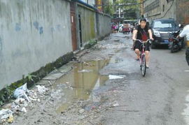 门前有条 污水河 过路很恼火 