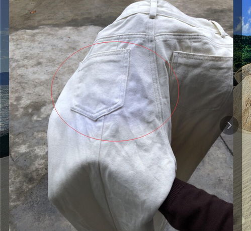 米白色裤子和红色短袖一起洗,结果裤子有一块明显的白色,是被染色了吗 