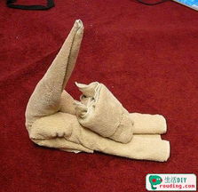 手工活制作折一个伸懒腰的毛巾猫的做法 