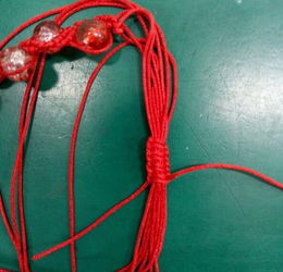 这款红绳手链怎么编 