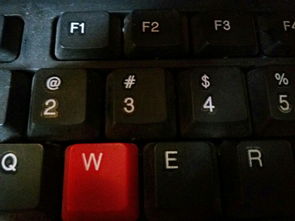 电脑键盘怎样切换数字跟符号 