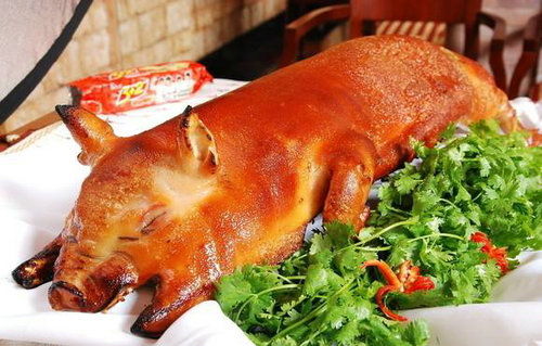 烤乳猪是用的多大的猪 烤乳猪是哪时候发明出来的菜系