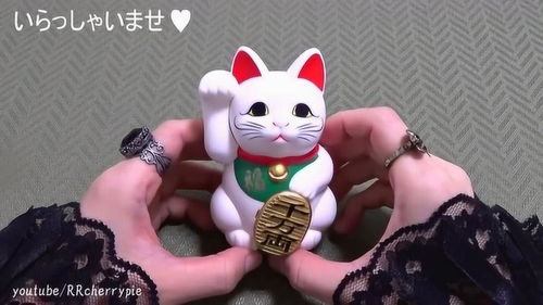 猫是一种日本玩偶,人们认为它能给主人带来好运 超可爱的 