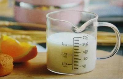 250ml牛奶是多少克,在标准状况下，1ml牛奶的重量大约是1克